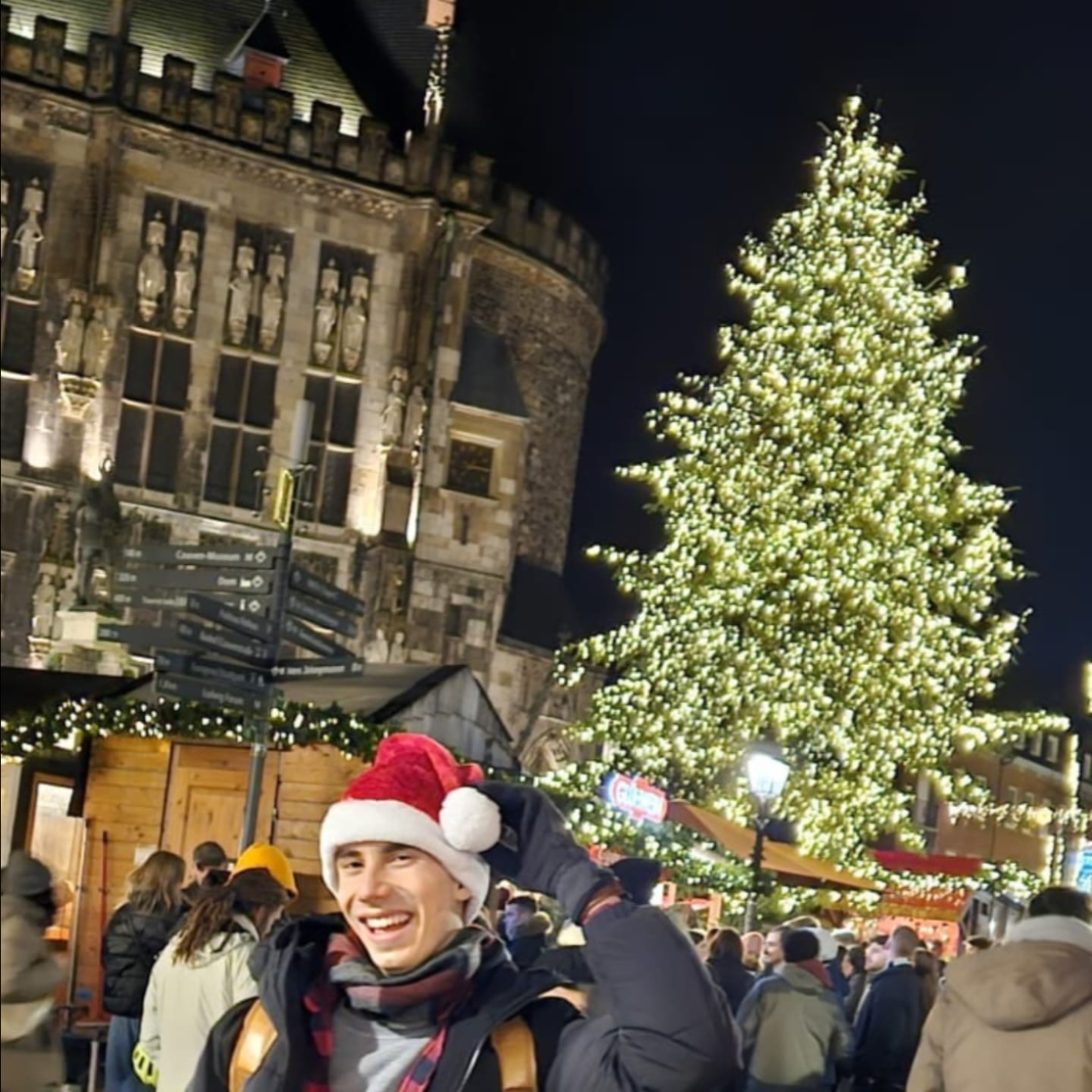 Me in a Santa hat at the Aachen Christmas market