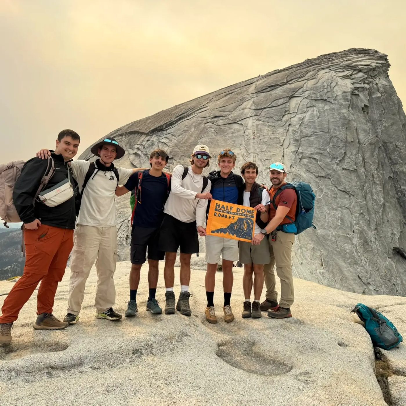 Friends on top of Half Dome